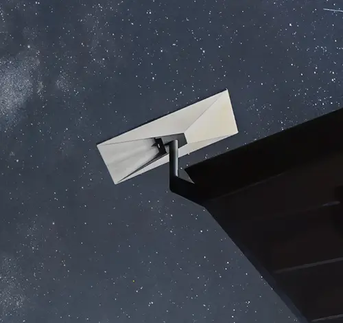 Starlink satellite dish mounted on rooftop under starry night sky